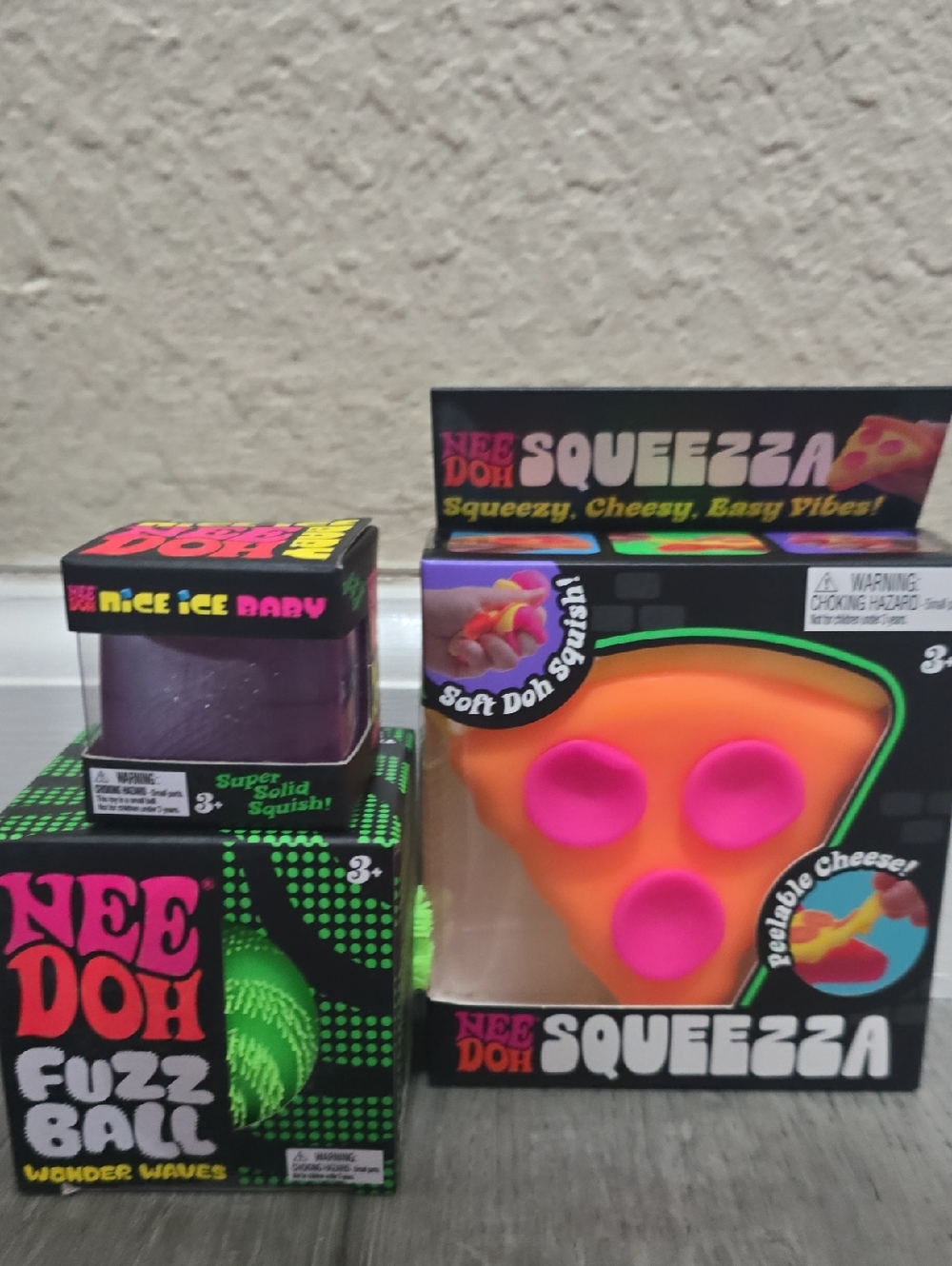 NeeDoh Squeeza Pizza Squishy, Green Wonder Waves Fuzz Ball,Purple Nice Ice Baby